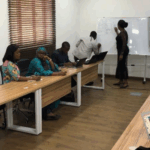 Group of people learning in a modern, relaxed environment