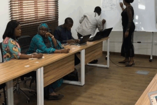 Group of people learning in a modern, relaxed environment